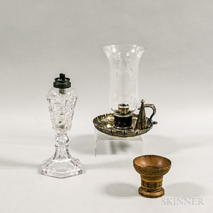 Sandwich-type Colorless Glass Oil Lamp, a Turned Wood Sander, and a Silver-plate Chamber Stick with Glass Shade. Estimate $20-200