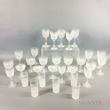 Thirty Pieces of Mostly Colorless Cut Glass Stemware