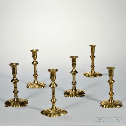 Three Pairs of English 18th Century Brass Candlesticks.