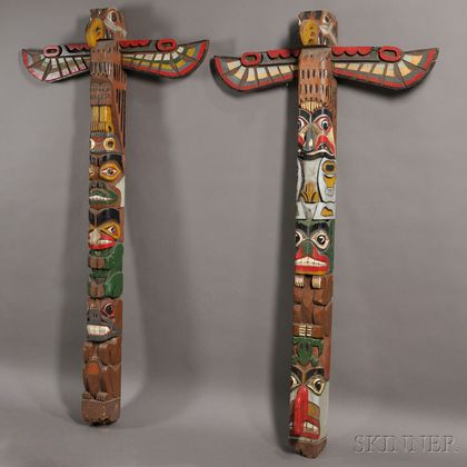 Two Large Polychrome Carved Wood Totem Poles
