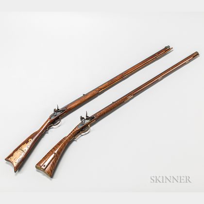 Two Reproduction Flintlock Rifles