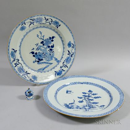 Two Blue and White Earthenware Dishes and a Bird Feeder