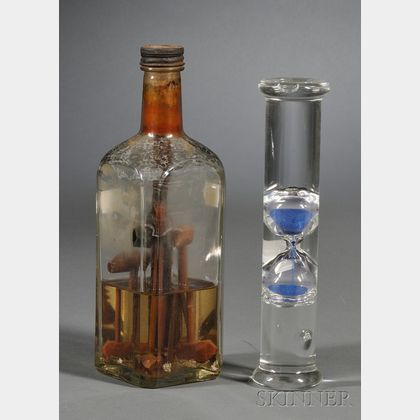 Glass Bottle Whimsy and a Hourglass Suspended in Fluid