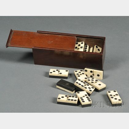 Set of Bone and Ebony Dominoes in a Mahogany Slide-lid Box