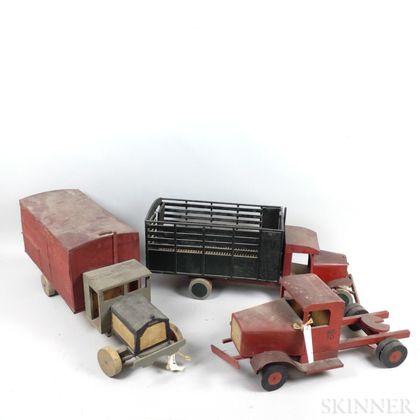 Six Painted Wood and Tin Trucks. Estimate $20-200