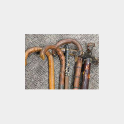 Seven Assorted Walking Sticks and Canes