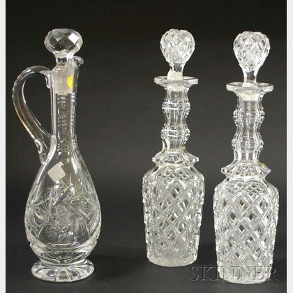 Pair of Colorless Cut Glass Decanters and a Colorless Cut Glass Footed Ewer