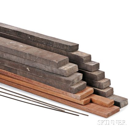 Box of Eleven Ebony Planks and Three Mahogany Planks. Estimate $150-250