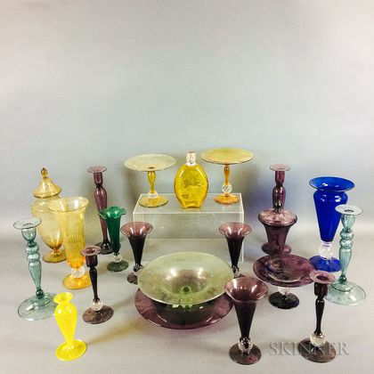 Twenty-one Pieces of Colored Etched Glass Tableware. Estimate $20-200