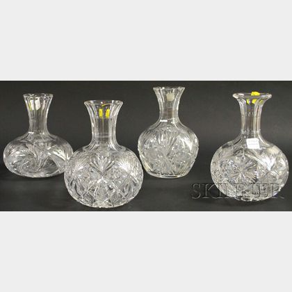 Four Colorless Cut Glass Carafes