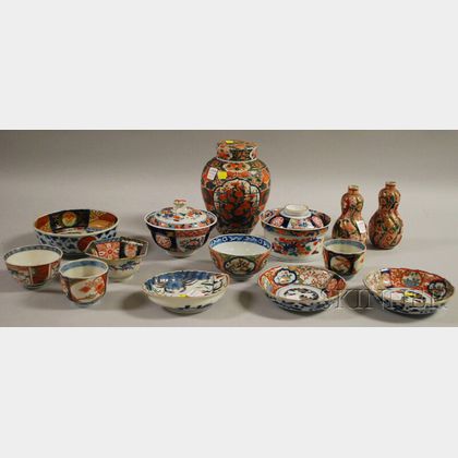 Twelve Pieces of Assorted Imari Porcelain Tableware and a Pair of Double Gourd Vases with Covers. 