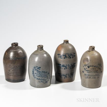 Four Cobalt-decorated Stoneware Advertising Jugs