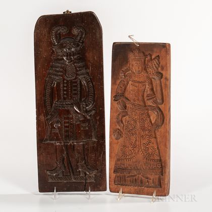 Two Carved Figural Cookie Boards