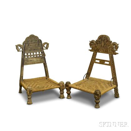 Two Spanish Carved Walnut and Woven Rope Low Chairs