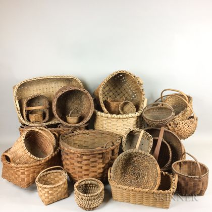 Twenty-three Woven Splint Baskets. Estimate $400-600