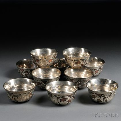 Ten Silver-lined Copper Bowls