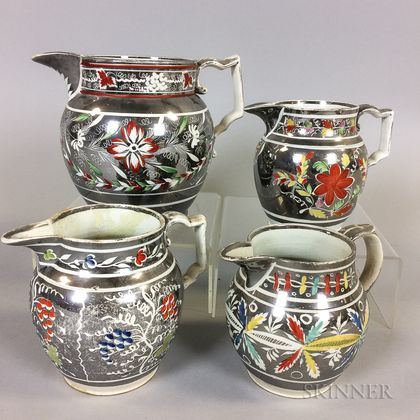Four Enameled Silver Resist Lustre Ceramic Jugs