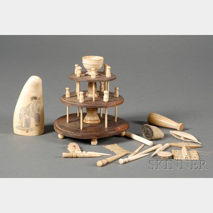 Small Engraved Whale's Tooth and Sixteen Scrimshaw Items
