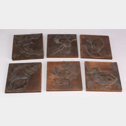Six Carved Wooden Plaques