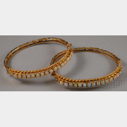 Pair of 14kt Gold and Opal Bangles