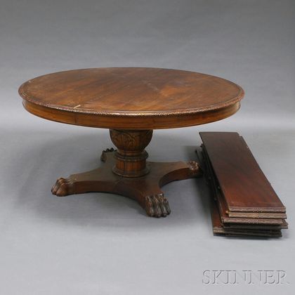 Carved Mahogany Pedestal Table and Eight Leaves