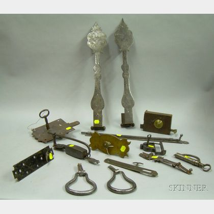 Fourteen Pieces of Early Iron and Brass Door Hardware