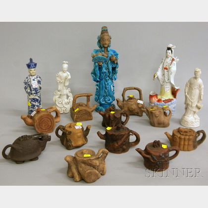 Eleven Asian Ceramic Teapots and Five Figures