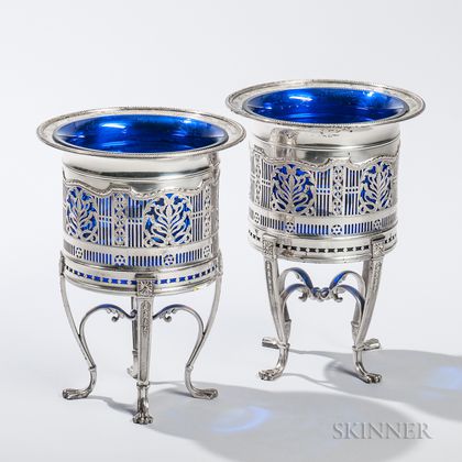 Pair of Silver-plated Wine Coolers, unmarked, each with a reticulated silver-plate frame and inset cobalt glass liner, ht. 9 in. 
