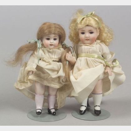 Two Large All-Bisque Girl Dolls
