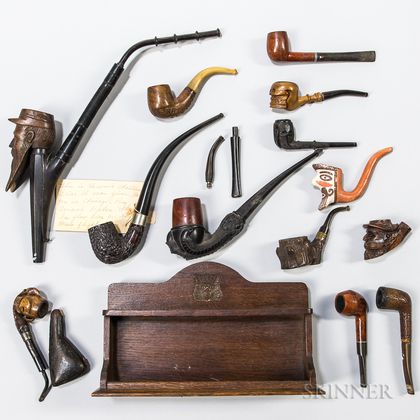 Group of Carved Pipes and a Rack