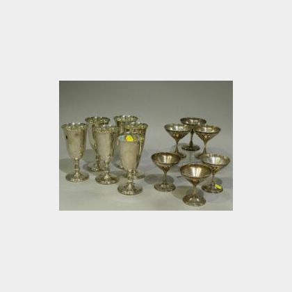 Set of Six Reed & Barton Sterling Silver Water Goblets and a Set of Six Wallace Sterling Silver Champagnes. 
