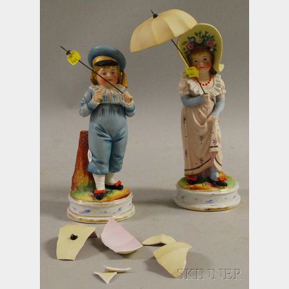 Pair of Continental Painted Bisque Boy and Girl with Umbrella Figures