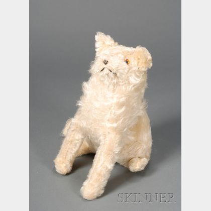 Cream-colored Mohair Sitting Dog