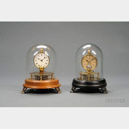Two Briggs Rotary Pendulum Clocks