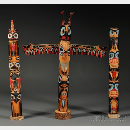 Three Polychrome Carved Wood Totem Poles