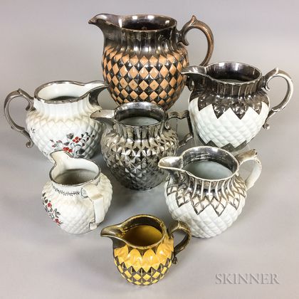 Seven Quilted Silver Lustre Ceramic Jugs