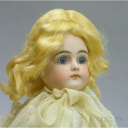 Swivel Head Bisque Doll