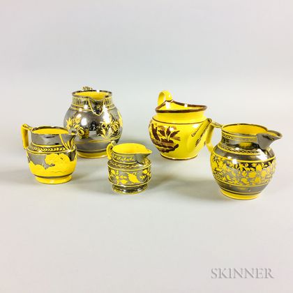 Five Yellow-glazed Lustre-decorated Ceramic Jugs