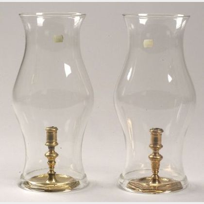 Two Brass Candlesticks with Hurricane Shades