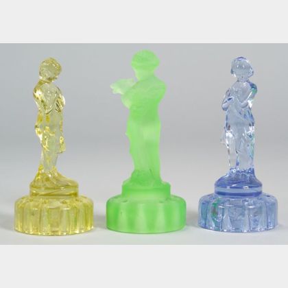 Three Figural Glass Flower Frogs