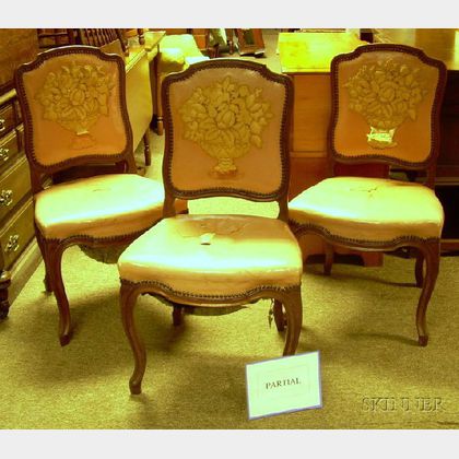 Set of Six Louis XV Style Floral Urn Appliqued Pink Leather Upholstered Carved Walnut Side Chairs. 