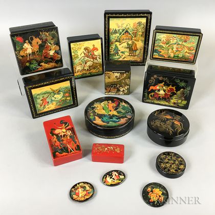 Twelve Russian Lacquered Boxes and Three Brooches. Estimate $200-300