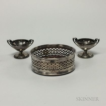 Pair of Silver-plated Salts and a Wood and Silver-plate Coaster. Estimate $20-40