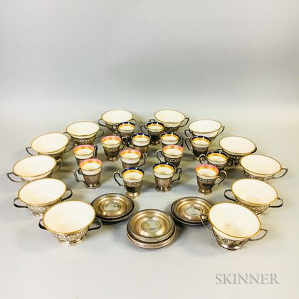 Twenty-six Lenox Sterling-mounted Teacups, Coffee Cups, and Saucers