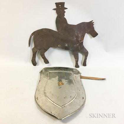 Sheet Metal Shield and a Horse and Rider