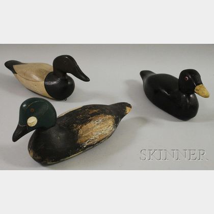 Three Carved and Painted Wooden Scoter, Goldeneye, and Canvasback Duck Decoys