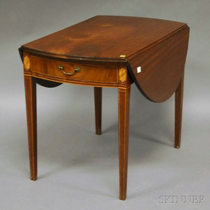 Federal Inlaid Mahogany and Mahogany Veneer Drop-leaf Pembroke Table with End Drawer. Estimate $1,000-1,500