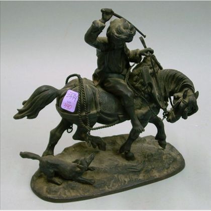 Cast Iron Boy on a Horse with Dog Figural Group. 