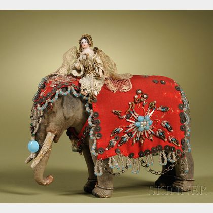 China Doll with Wood Body Riding an Elephant