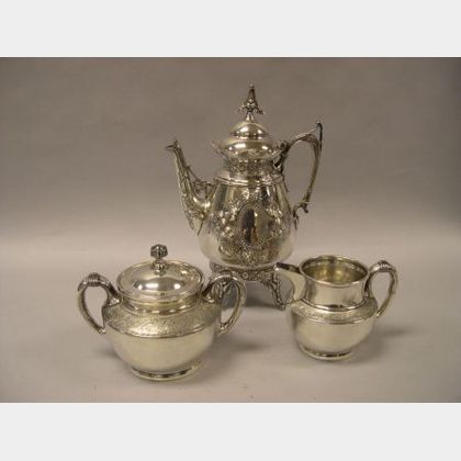 Victorian Reed & Barton Silver Plated Creamer and Covered Sugar, and a Simpson, Hall, Miller & Co. Aesthetic Silver Plated Coffeepot. 